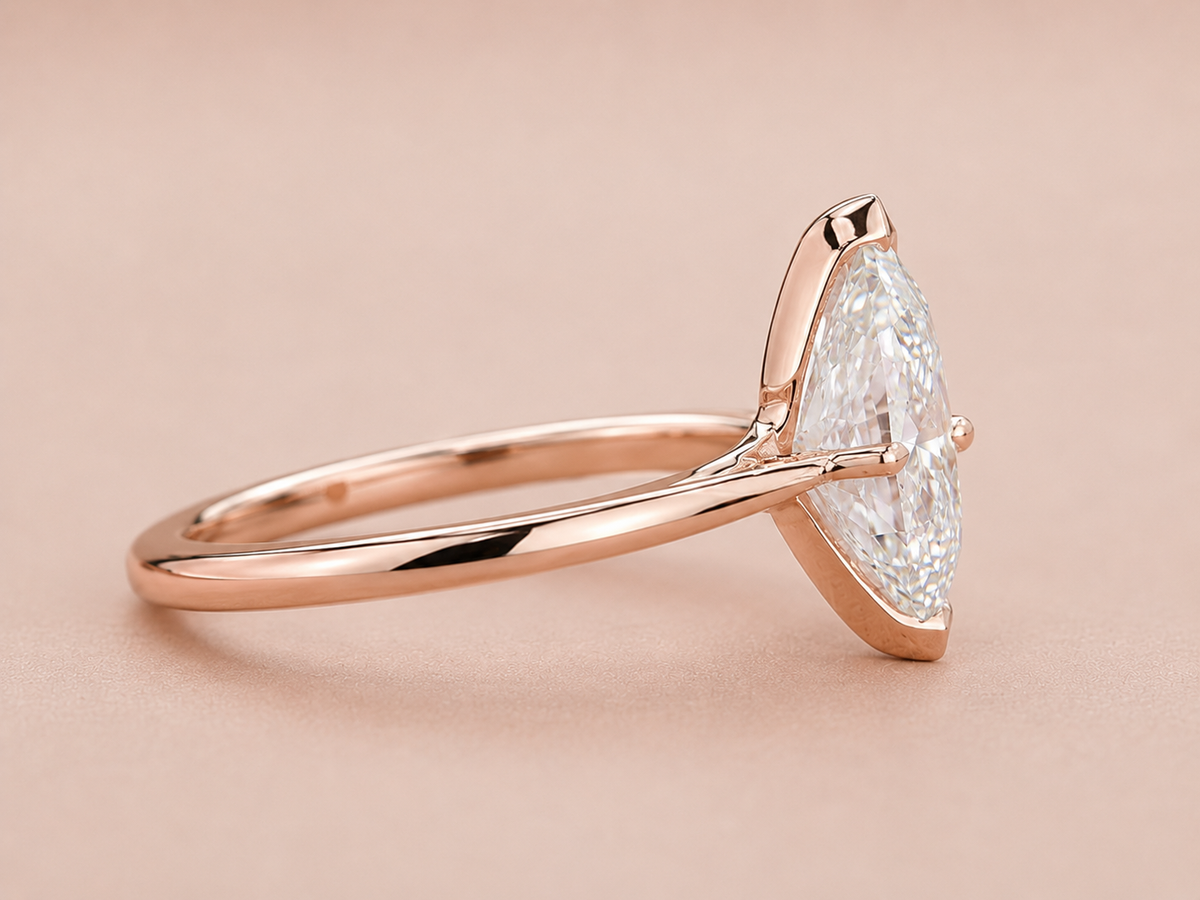 Dutch marquise cut diamond solitaire engagement ring in rose gold