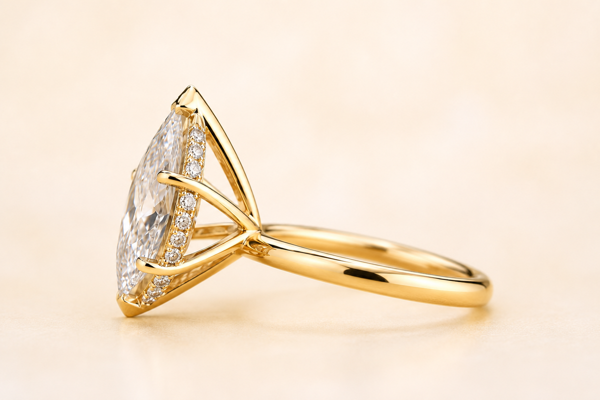 Dutch marquise diamond cathedral setting ring in yellow gold