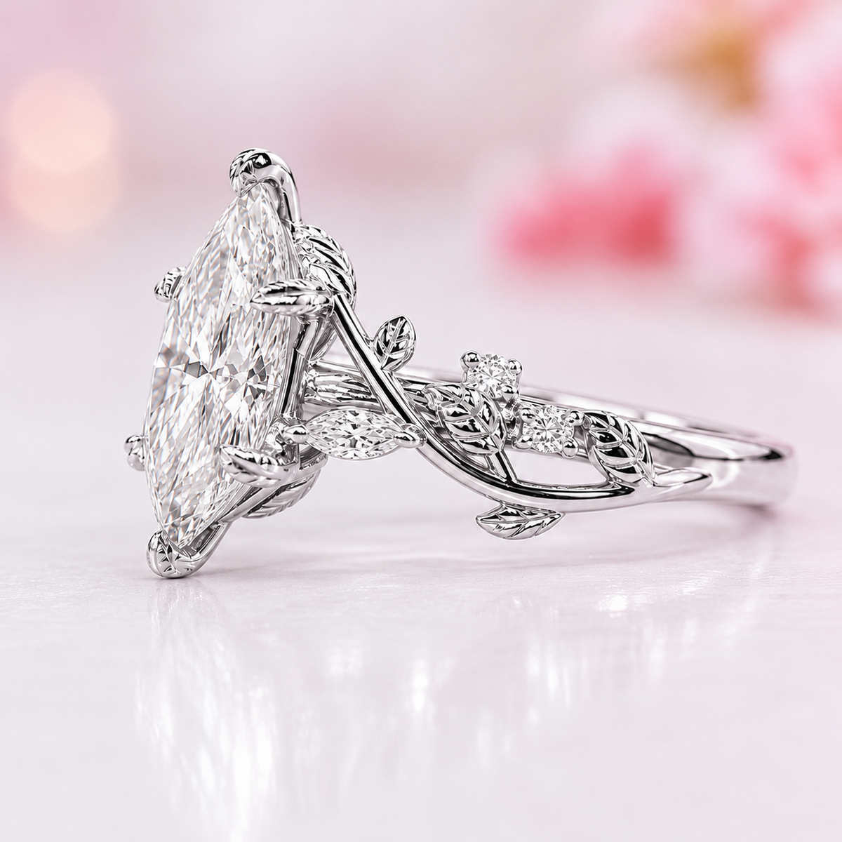 Nature inspired engagement ring with dutch marquise diamond in white gold