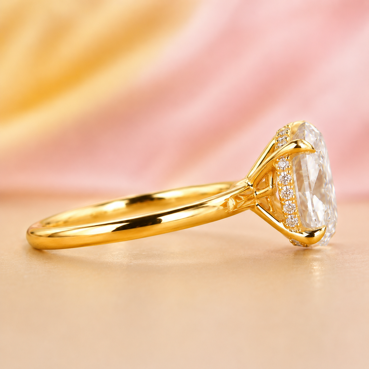 Oval lab grown diamond hidden halo engagement ring in yellow gold