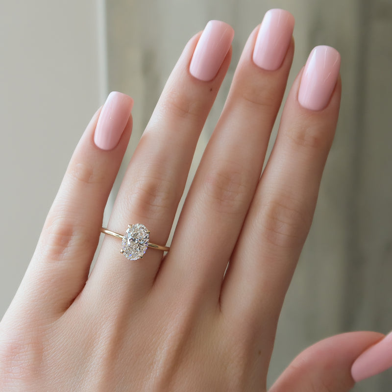 Oval Cut Solitaire Diamond Engagement Ring in Yellow Gold | Custom Lab-Grown Diamond Ring