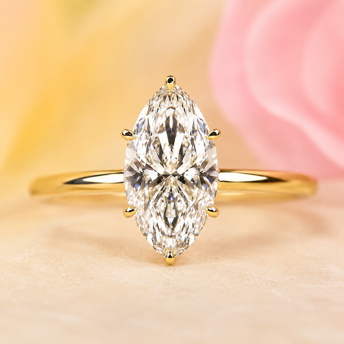 Hidden halo marquise engagement ring in yellow gold
