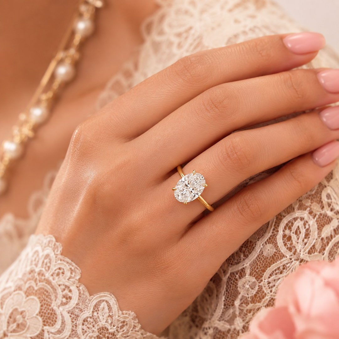 Hidden Halo Oval Engagement Ring in Yellow Gold