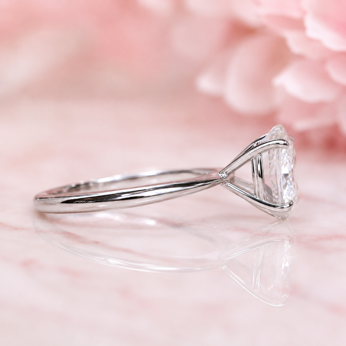 Oval solitaire engagement ring with tapered shank in 925 sterling silver