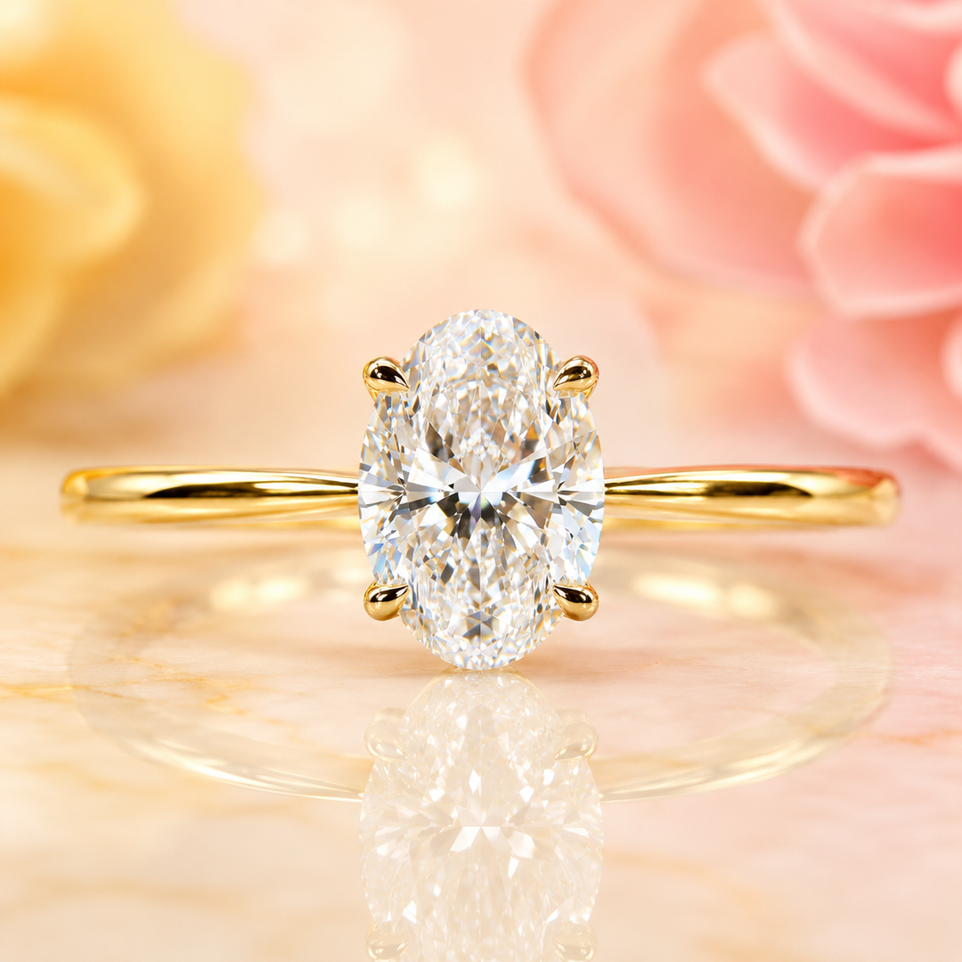 Oval Solitaire Engagement Ring with Tapered Shank in Yellow Gold