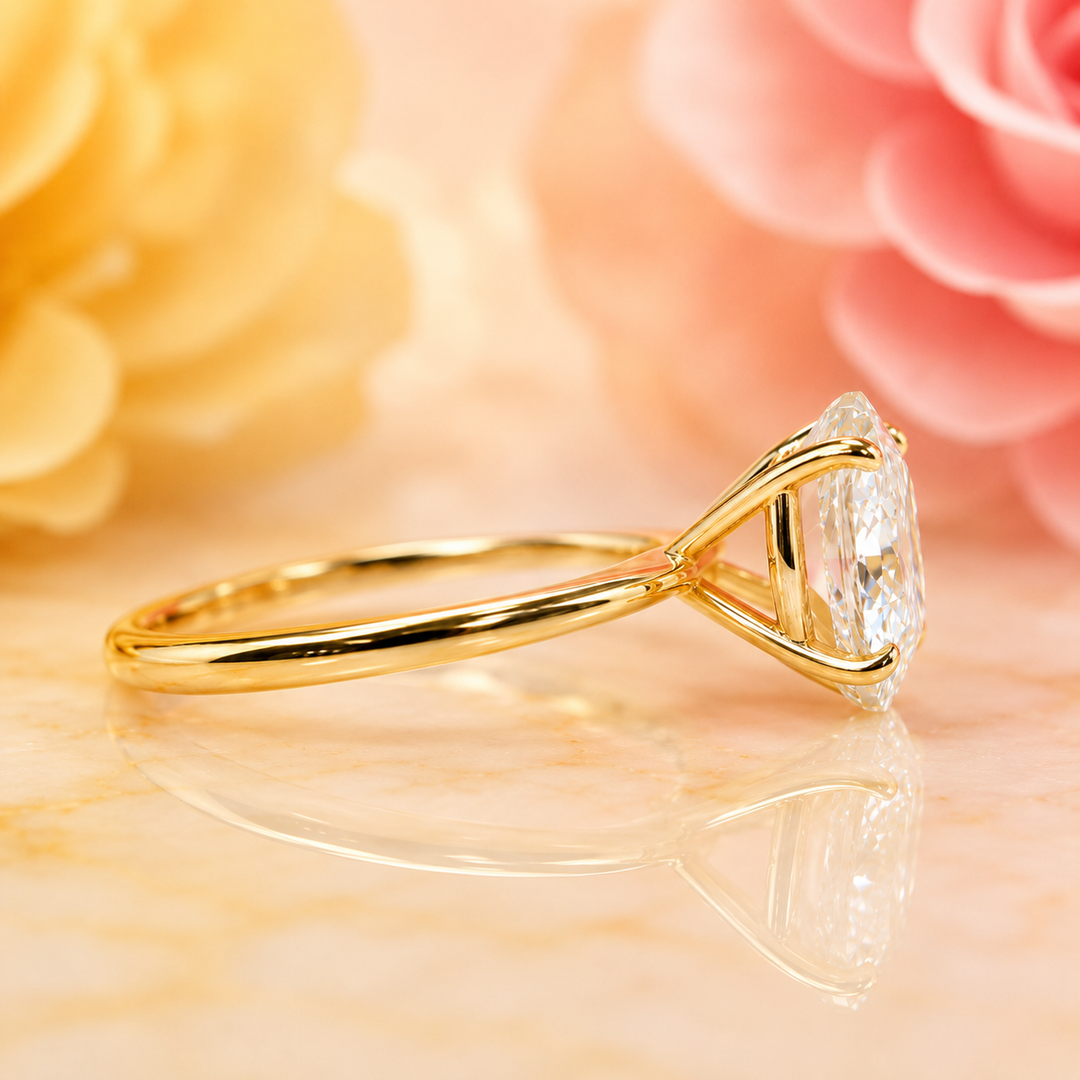 Oval Solitaire Engagement Ring with Tapered Shank in Yellow Gold