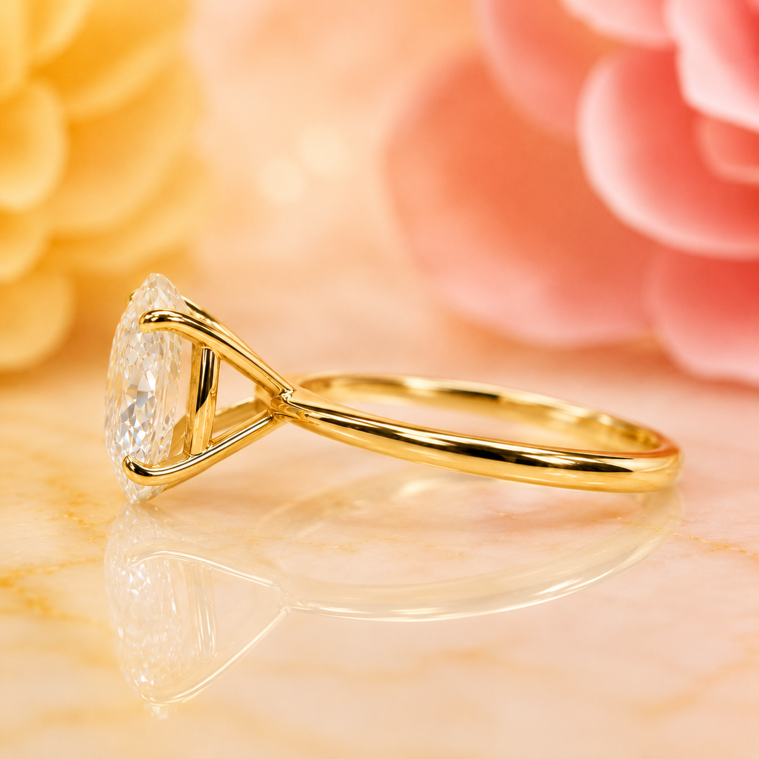Oval Solitaire Engagement Ring with Tapered Shank in Yellow Gold