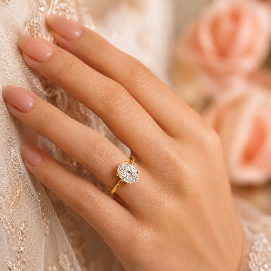 Oval Solitaire Engagement Ring with Tapered Shank in Yellow Gold