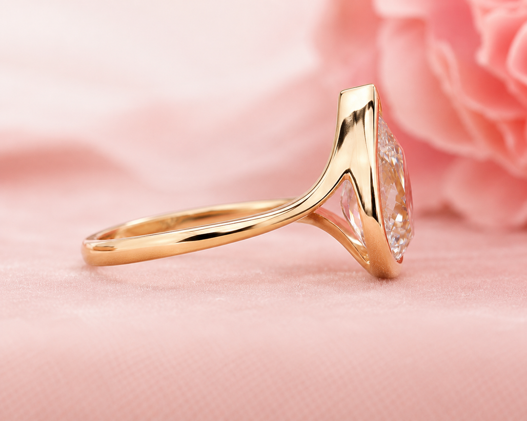 Pear Shaped Engagement Ring with Timeless and Unique Design in Yellow Gold