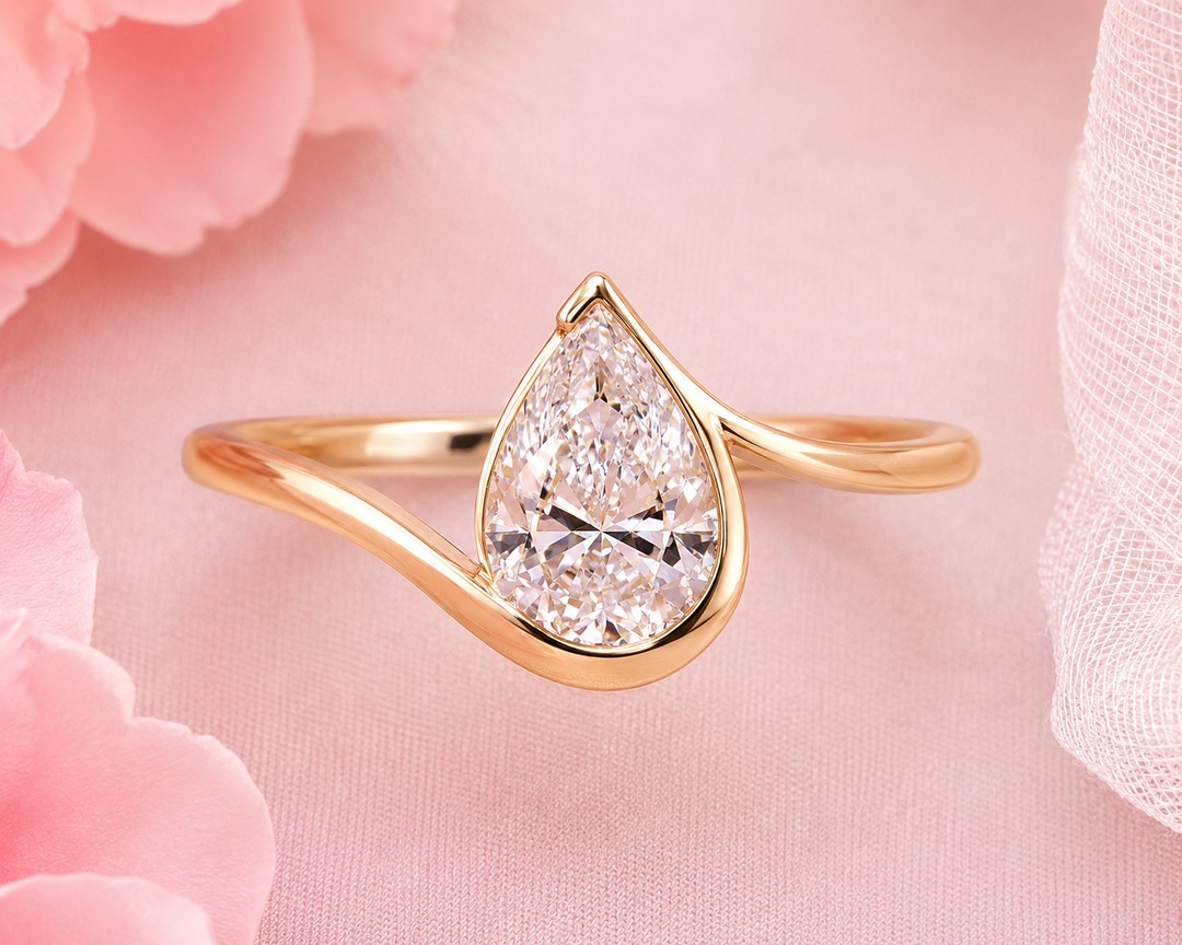 Pear Shaped Engagement Ring with Timeless and Unique Design in Yellow Gold