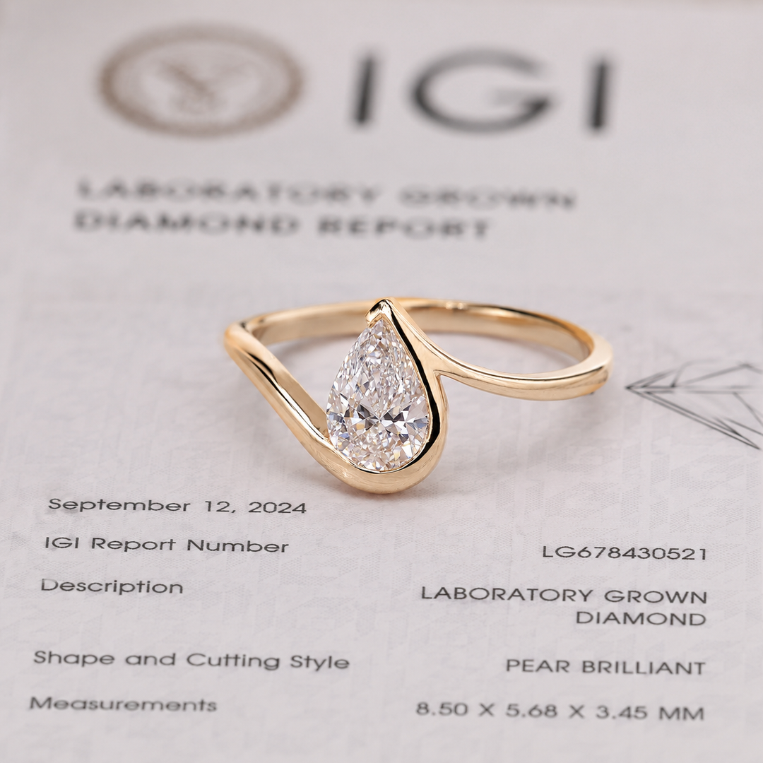Pear Shaped Engagement Ring with Timeless and Unique Design in Yellow Gold