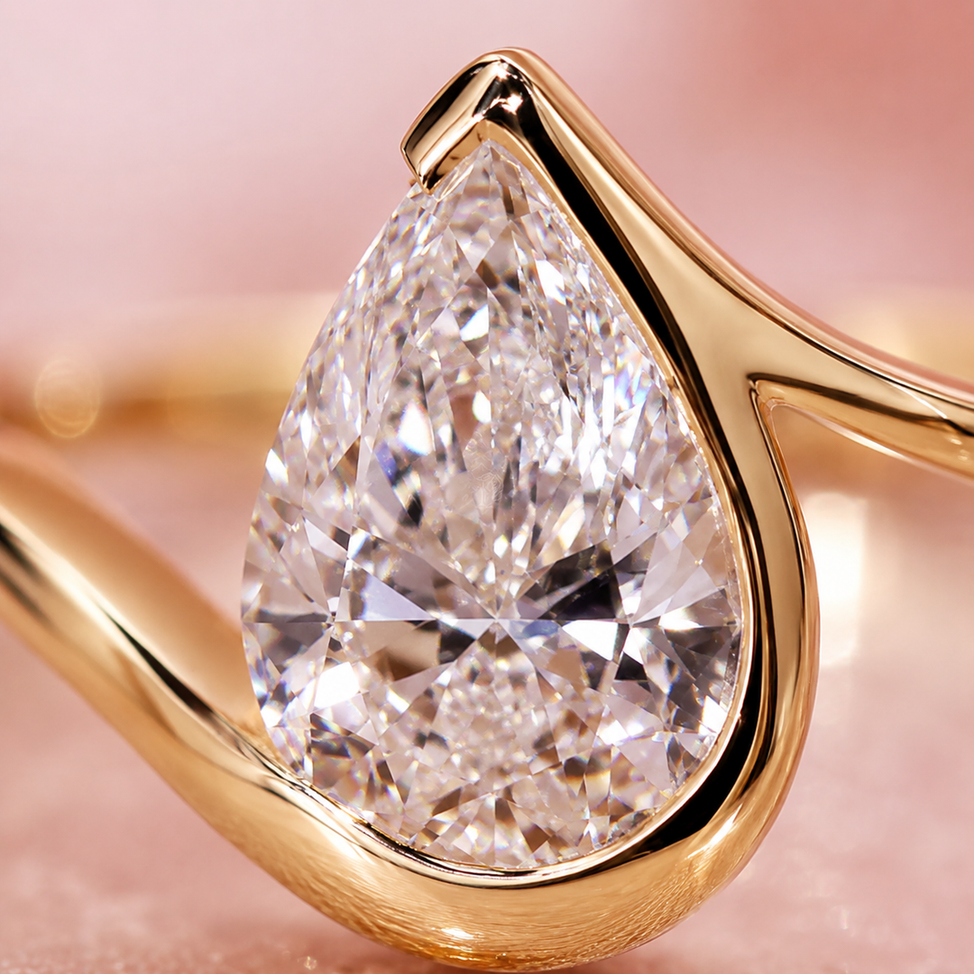 Pear Shaped Engagement Ring with Timeless and Unique Design in Yellow Gold