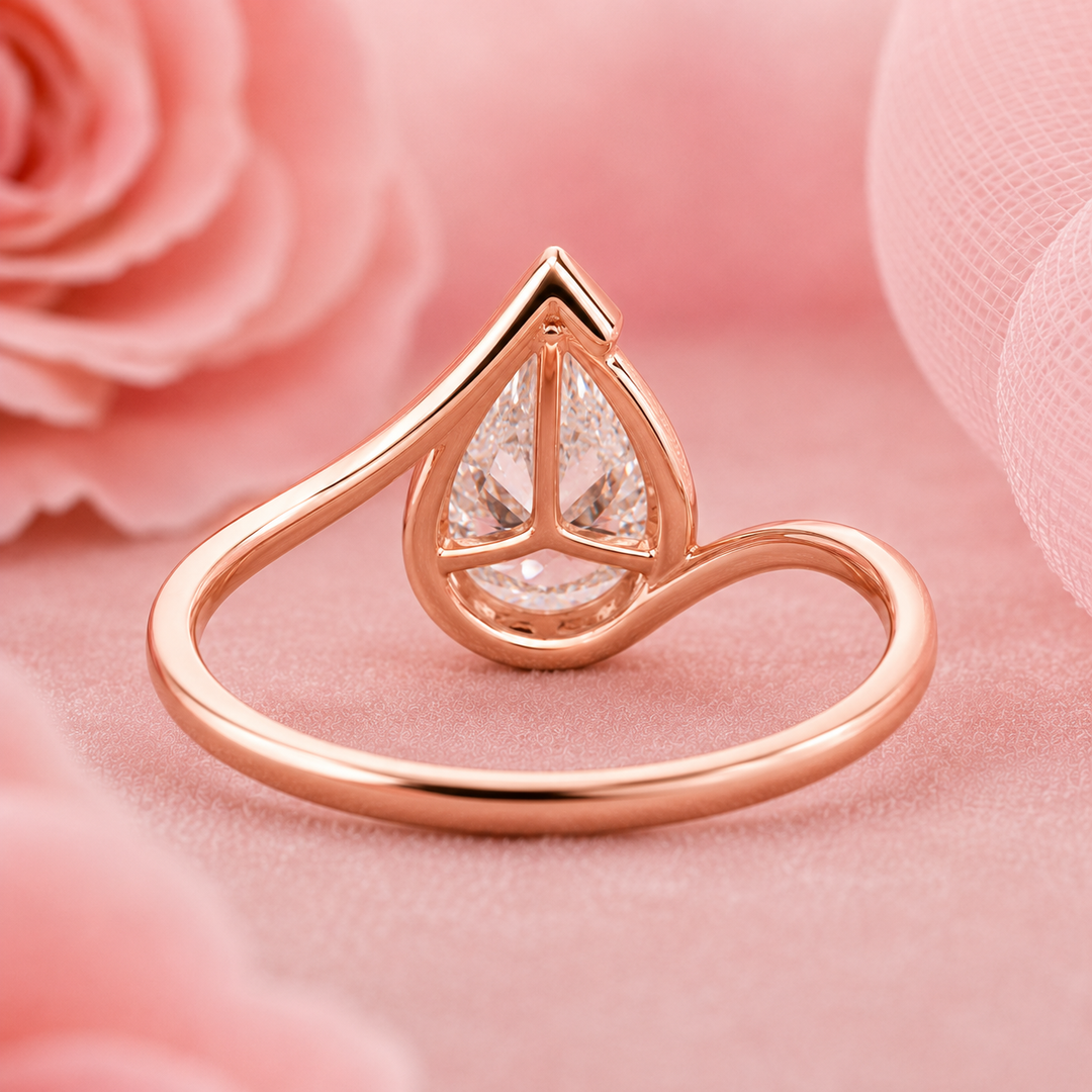 Pear Shaped Engagement Ring with Timeless and Unique Design in Rose Gold