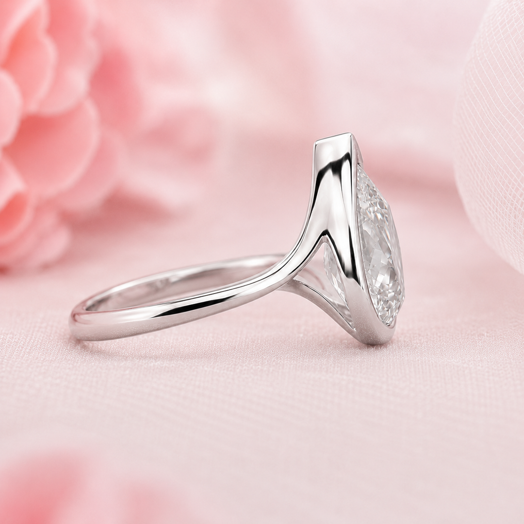 Pear Shaped Engagement Ring with Timeless and Unique Design in White Gold