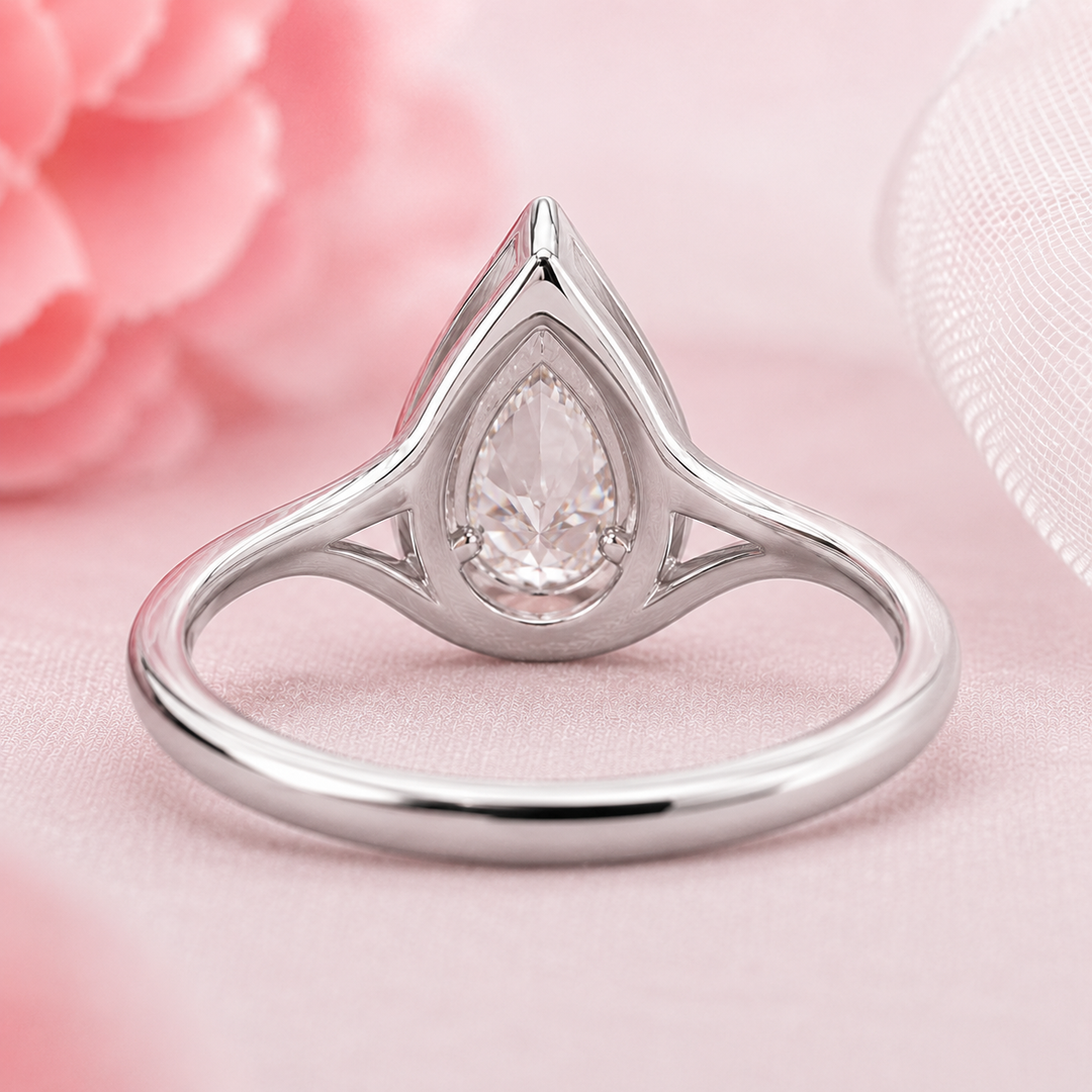 Pear Shaped Engagement Ring with Timeless and Unique Design in White Gold