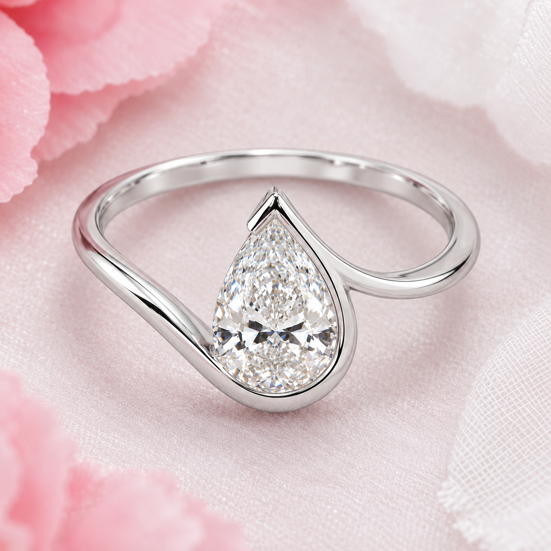 Pear Shaped Engagement Ring with Timeless and Unique Design in White Gold