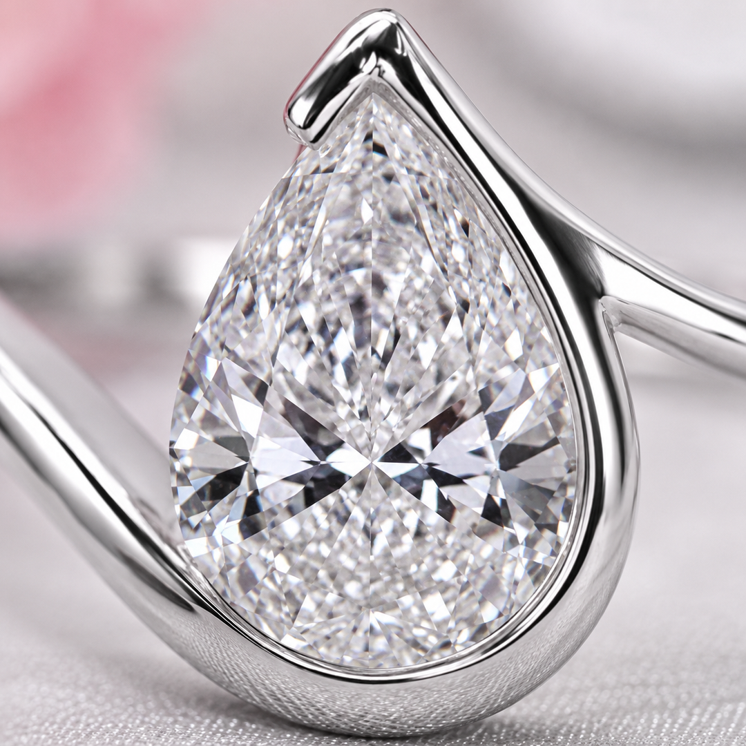 Pear Shaped Engagement Ring with Timeless and Unique Design in White Gold