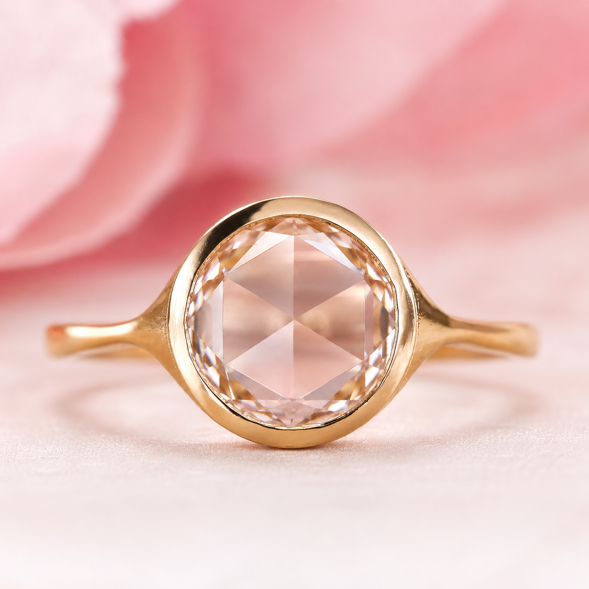 Rose cut engagement ring in bezel setting in yellow gold