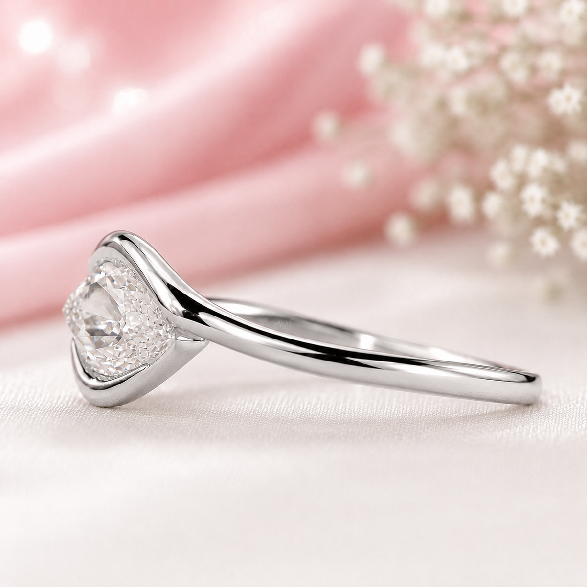 Marquise diamond engagement ring in east west style in white gold