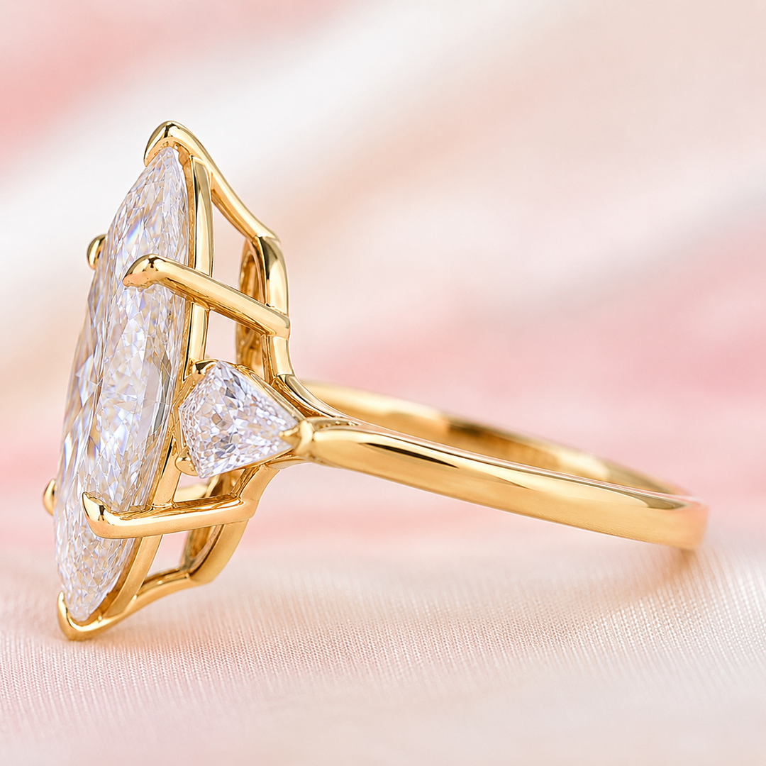 Three Stone Marquise Engagement Ring with Side Kite Cut Diamonds in Yellow Gold
