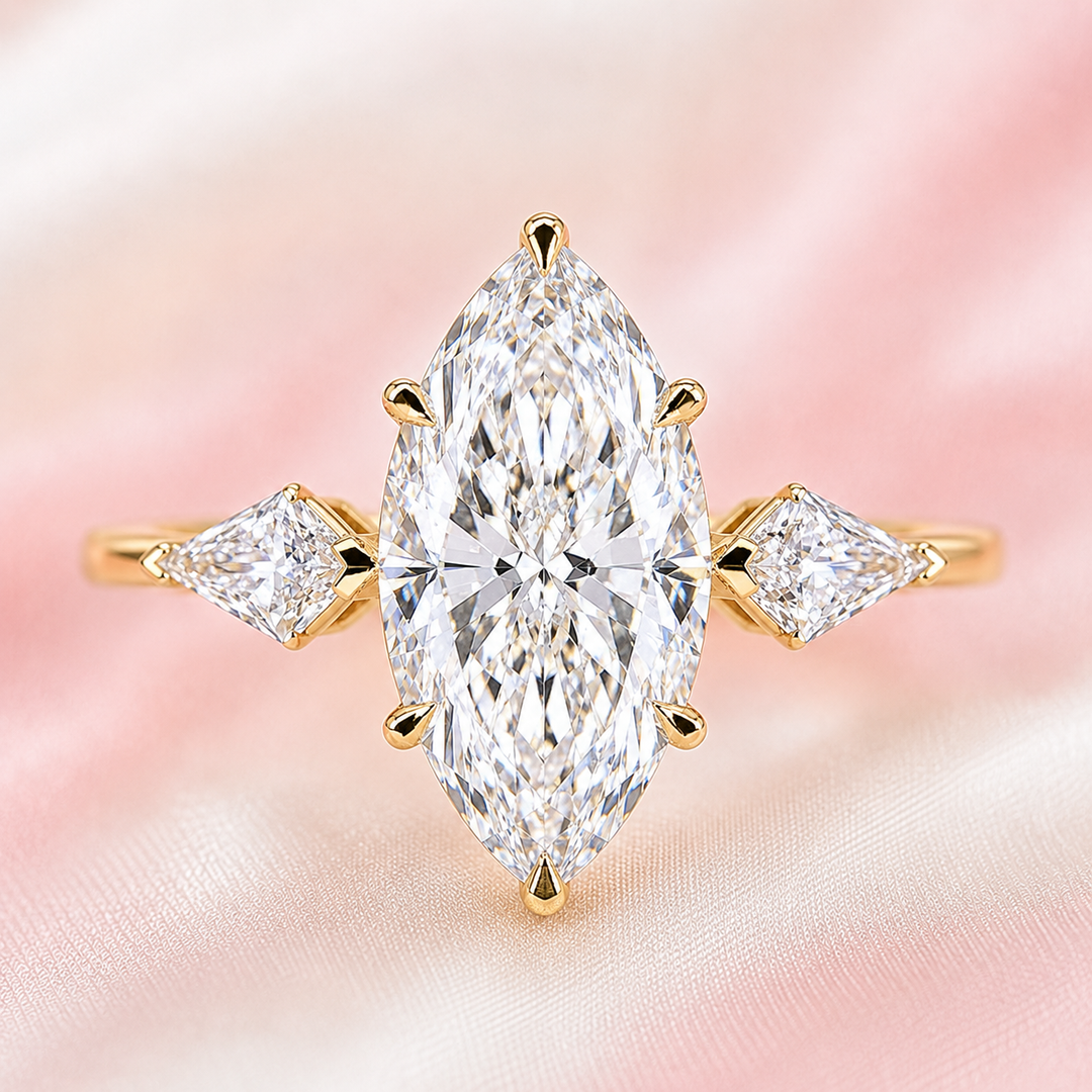 Three Stone Marquise Engagement Ring with Side Kite Cut Diamonds in Yellow Gold