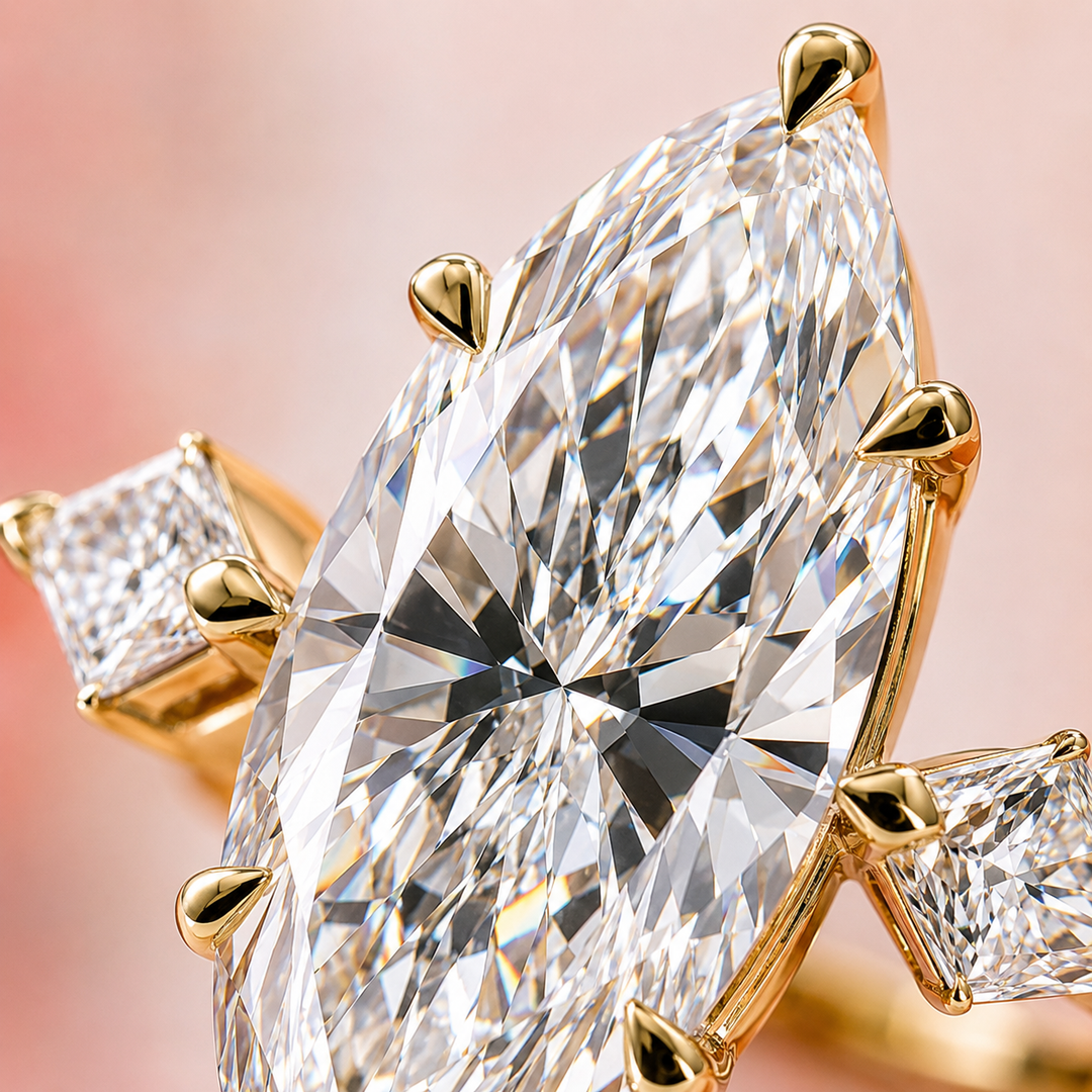 Three Stone Marquise Engagement Ring with Side Kite Cut Diamonds in Yellow Gold