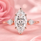 Three Stone Marquise Engagement Ring with Side Kite Cut Diamonds in Rose Gold