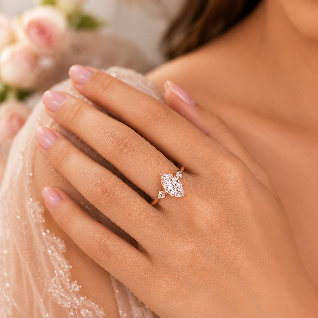 Three Stone Marquise Engagement Ring with Side Kite Cut Diamonds in Rose Gold