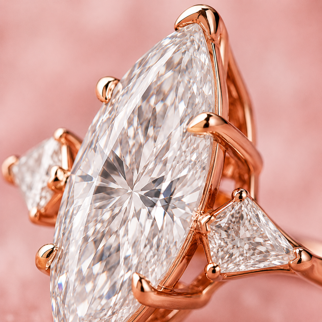 Three Stone Marquise Engagement Ring with Side Kite Cut Diamonds in Rose Gold
