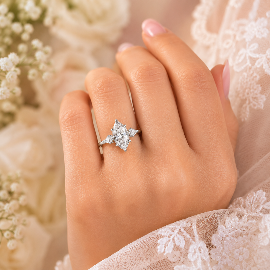 Three Stone Marquise Engagement Ring with Side Kite Cut Diamonds in White Gold