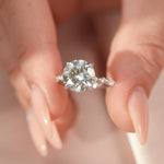 Load and play video in Gallery viewer, Round Cut Solitaire Diamond Engagement Ring with Side Accents in White Gold | Custom Lab-Grown Diamond Ring
